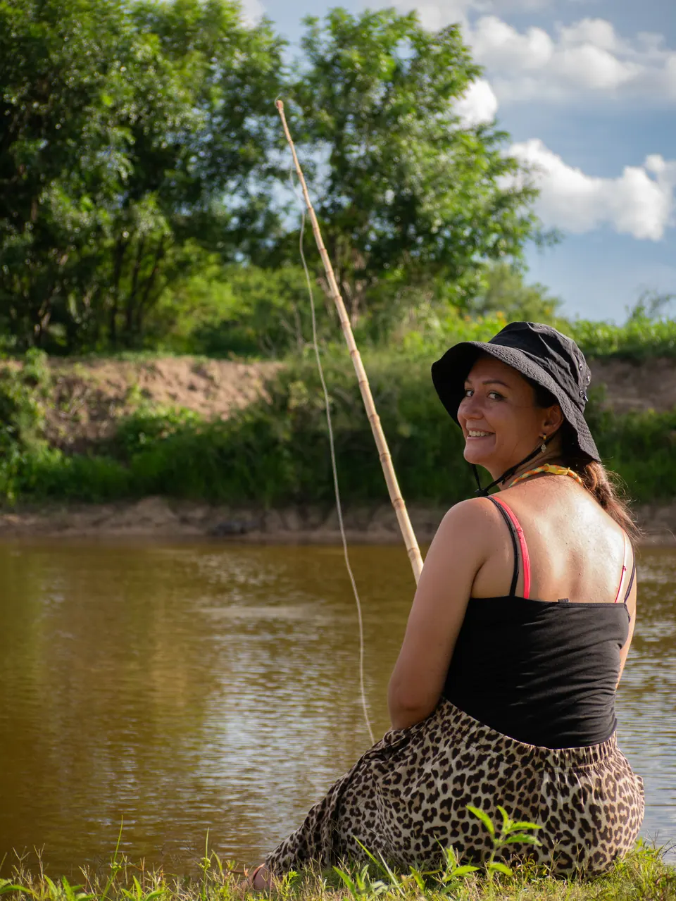 A guest piranha fishing at the pond