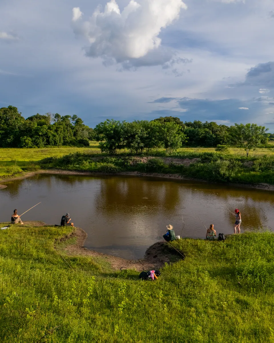 Guests fishing at the pond, seen from above