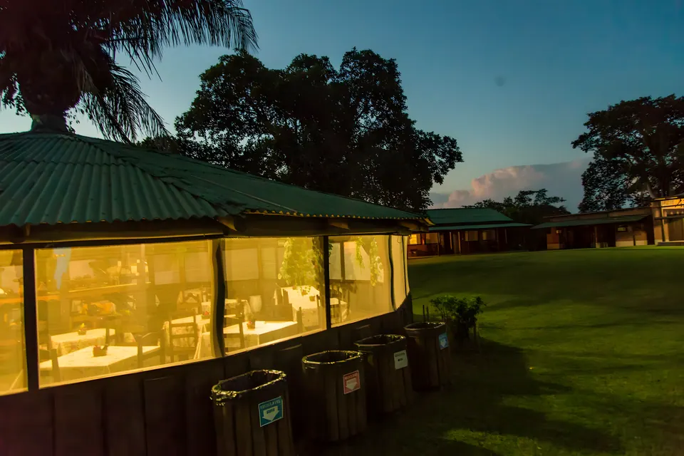 The dining hall lit up at dusk